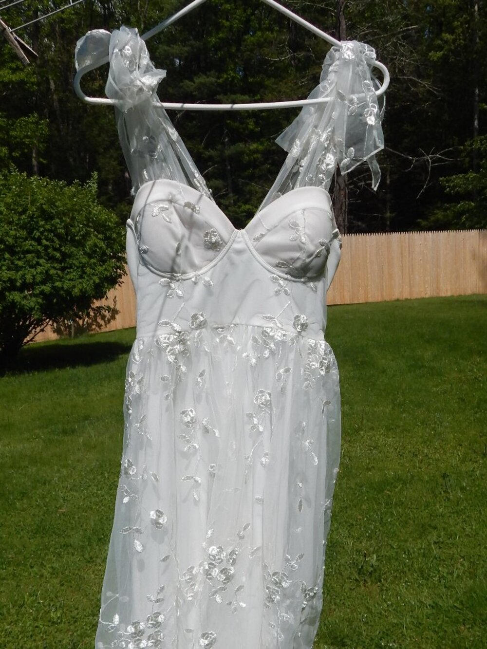White graduation, prom, or celebration dress.